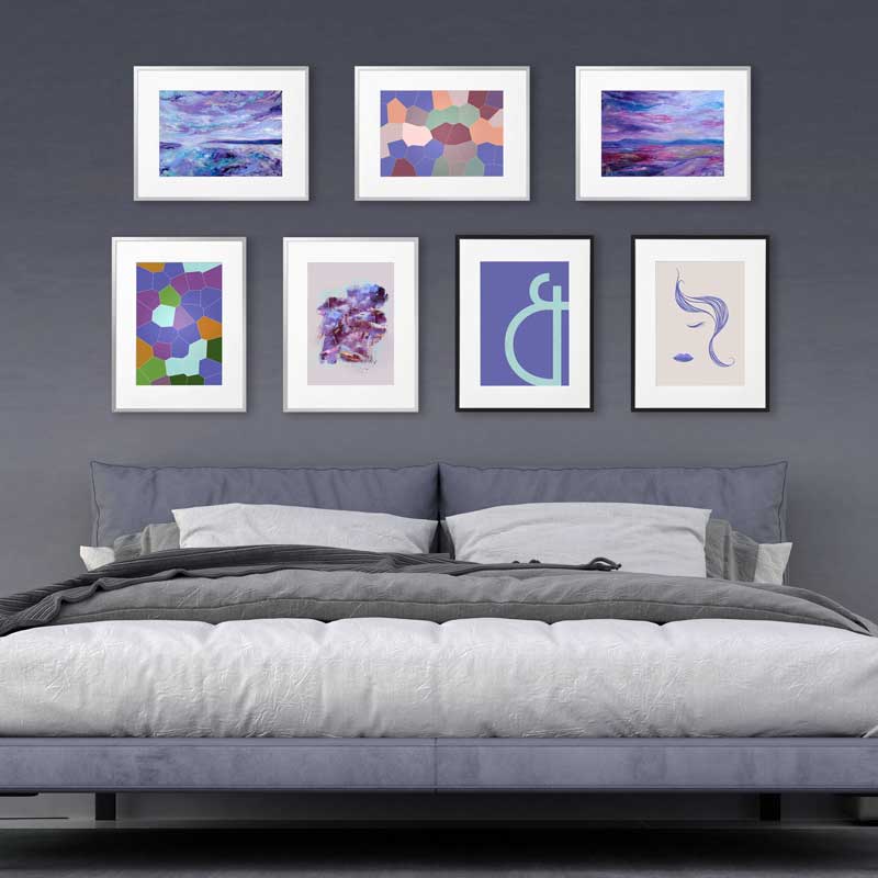 Gallery wall display of art prints by Claude & Leighton which are perfect to add a splash of Pantone 2022 Very Peri violet blue to home and office interior colour schemes.