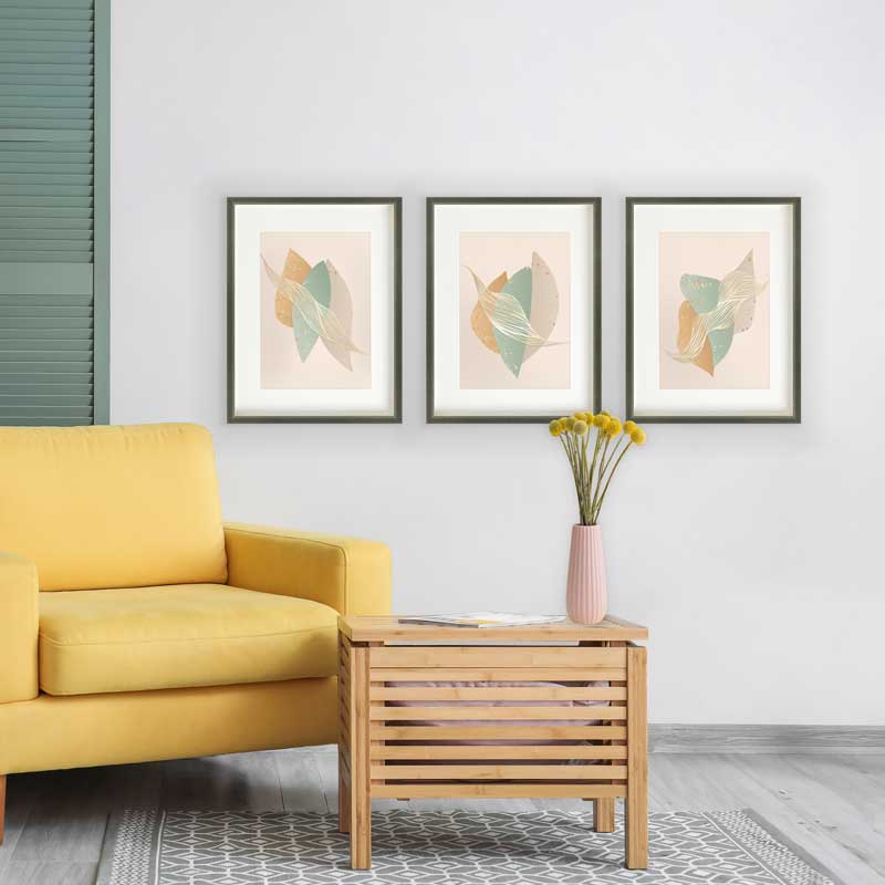 Set of three Gold Flake Abstract Shapes Art Prints by Claude & Leighton. Geometric design art in muted shades of pale green and gold ideal as bedroom art and for relaxing, calm interiors.